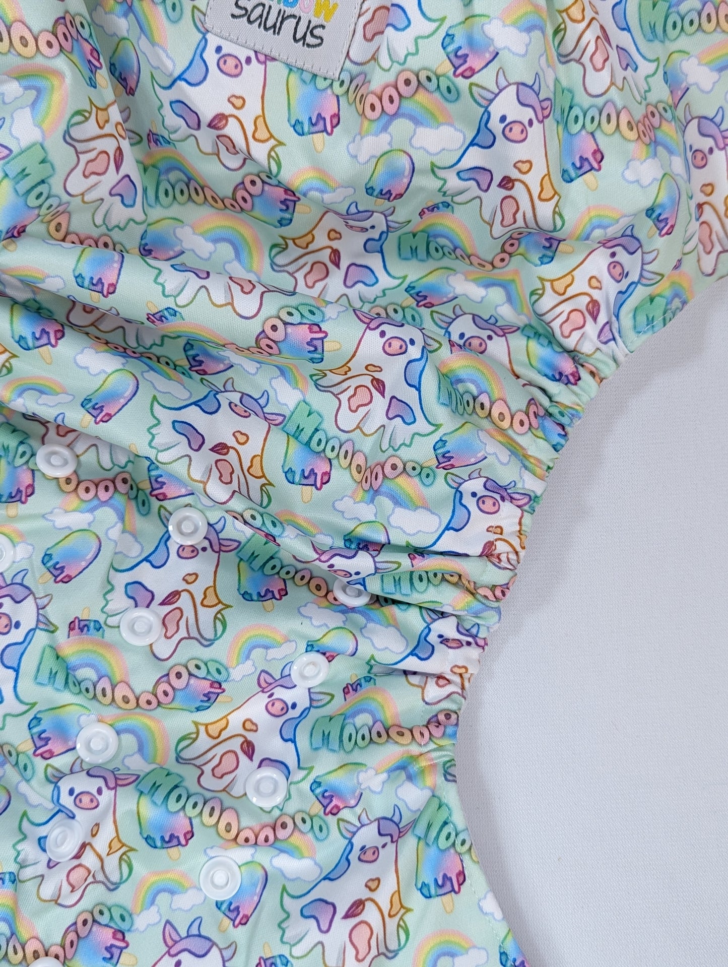 Rainbowsaurus - ECOsaurus Fit - It Builds Character - Rainbow MooCow