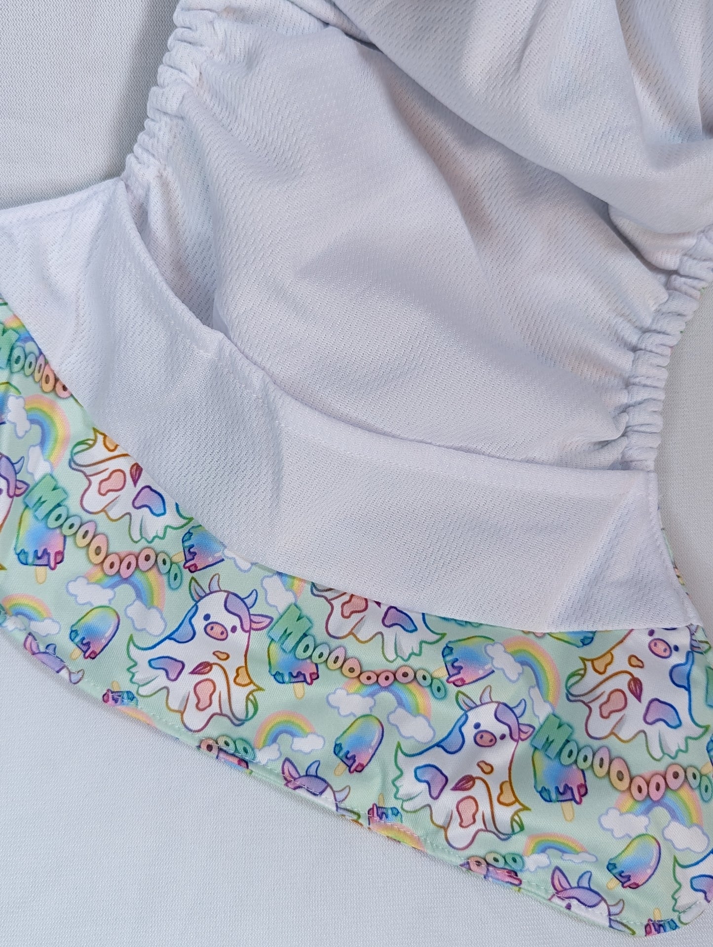 Rainbowsaurus - ECOsaurus Fit - It Builds Character - Rainbow MooCow